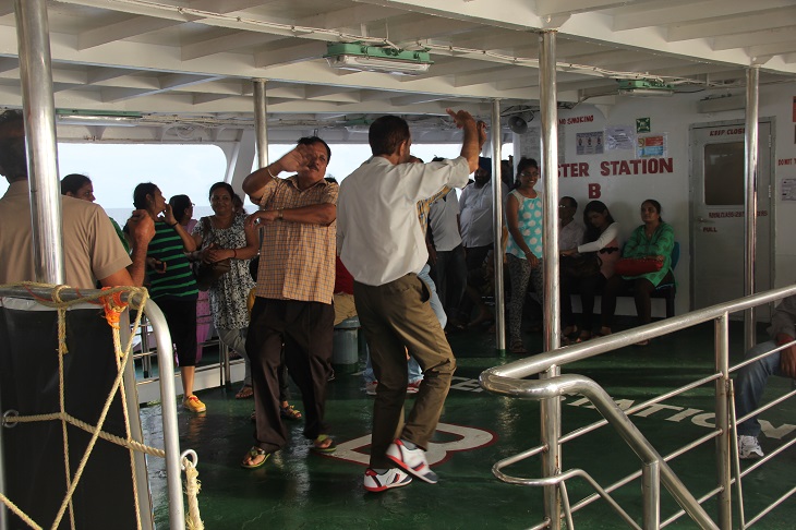 Perty time - Indian tourists dancing on the deck
